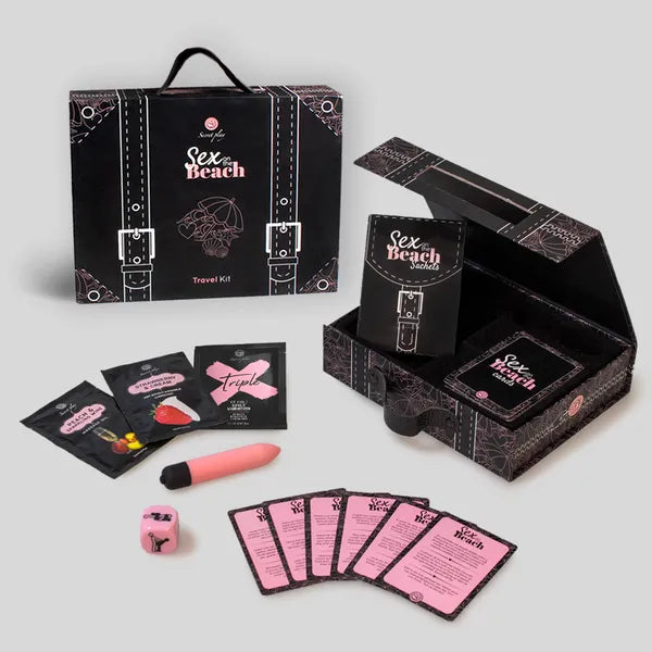 Coffret présenté ouvert et sa mallette avec les articles suivants :
Cartes de défis, mini vibromasseur, dé Kamasutra, monodose d’huile de massage,
monodose de lubrifiant et monodose de gel intensifiant