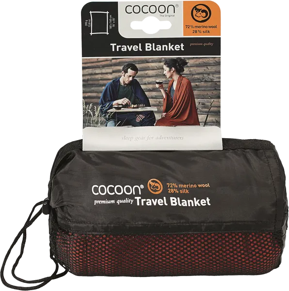 Couverture de voyage en laine et soie – terracotta – vue de la couverture dans son sac de rangement