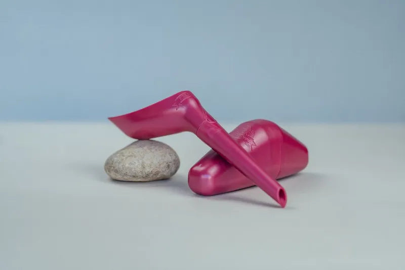 Le pisse-debout fuchsia : présenté monté en sur sa boite