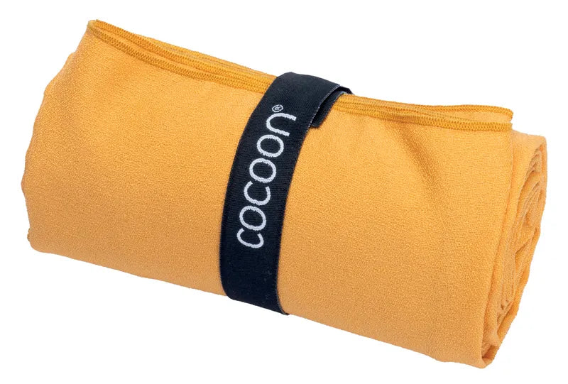 Serviette de voyage ultralégère Cocoon – vue de la serviette orange enroulée