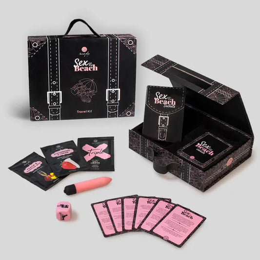 Coffret présenté ouvert et sa mallette avec les articles suivants :
Cartes de défis, mini vibromasseur, dé Kamasutra, monodose d’huile de massage, 
monodose de lubrifiant et monodose de gel intensifiant