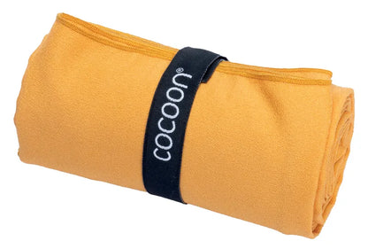 Serviette de voyage ultralégère Cocoon – vue de la serviette orange enroulée