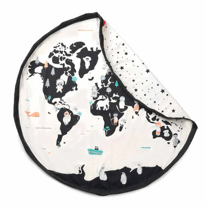 Sac de rangement et tapis de jeu Play and Go – motif monde – vue du tapis de jeu avec un coin plié laissant apparaître le verso et les étoiles
