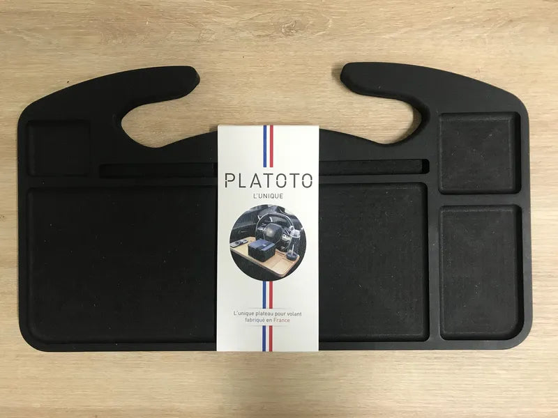 Tablette réversible pour voiture Albert et Marcel  de Platoto  en version noire -en vue de face avec emballage  
